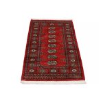 Pakisztáni szőnyeg rózsaszín Bokhara 79x131 kézi csomózású szőnyeg